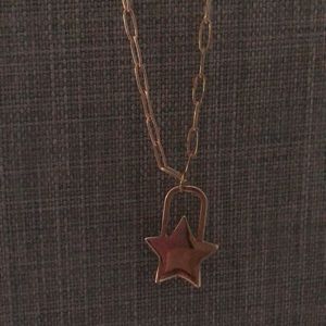 Gold platter star lock necklace